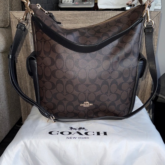 Coach Handbags - Coach Signature Brown and Black Shoulder Bag with duster